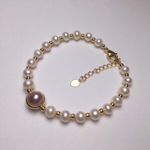 Elegant Pearl Bracelet With Transfer Bead Design