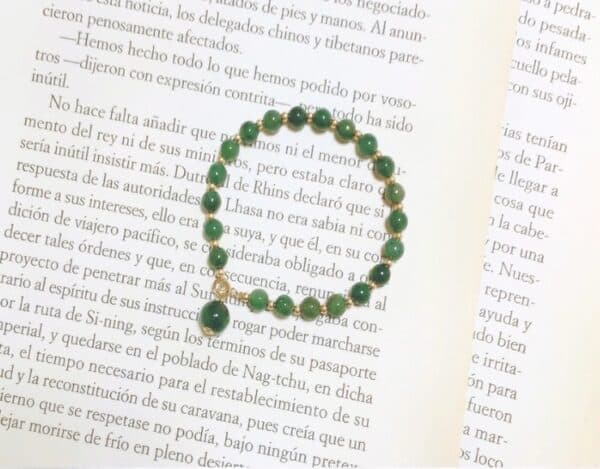 Handmade in dark oil green jade 14k bag gold small gold beads white bracelet goddess
